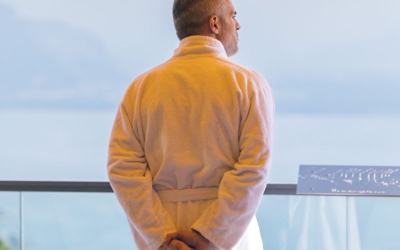 Patient enjoying the view from his room's terrace