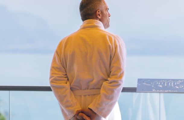 Patient enjoying the view from his room's terrace